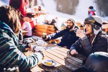 dining with friends in a ski town