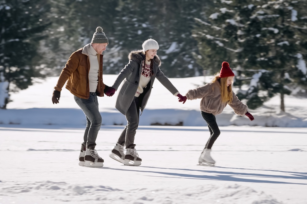 family ice skating outside