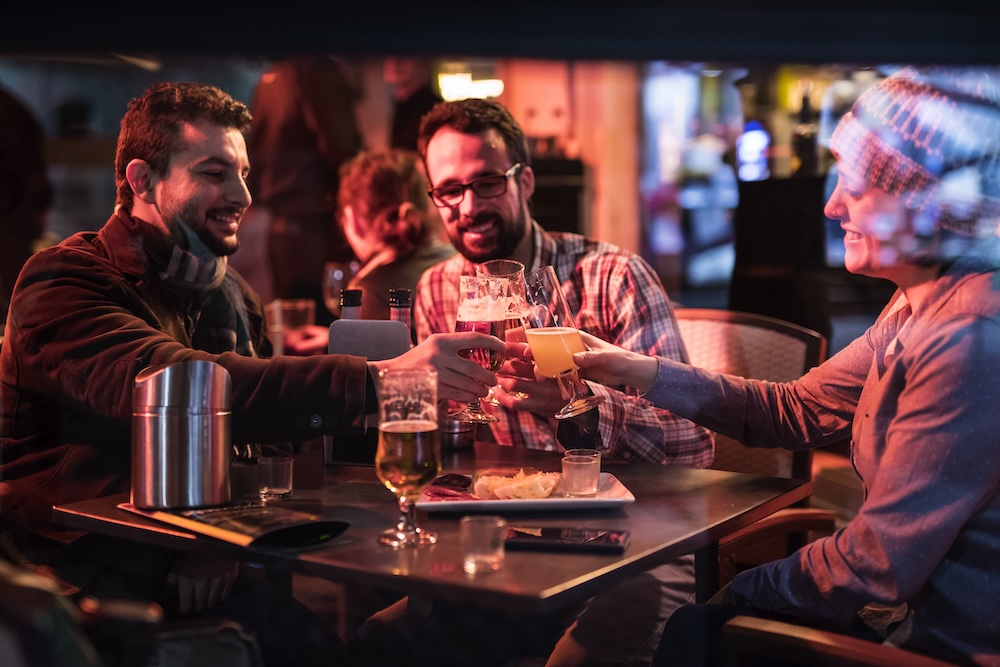 friends at a bar in winter